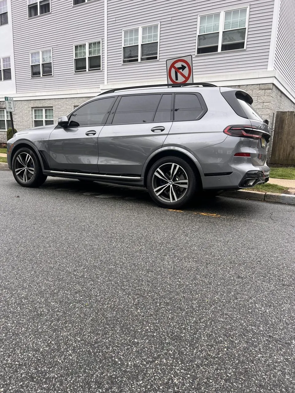 BMW X7 with ceramic window tint by Sam's Window Tinting