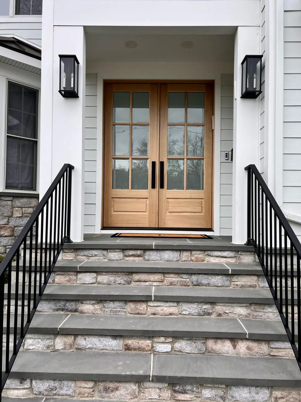 Residential entry with window film on the door glass